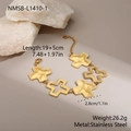 Dettaglio del bracciale in acciaio inossidabile placcato oro 18k con ciondoli a croce - Oro 18K / Bracciale (NMSB-L1410-1)