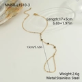 Detailed macro view of 18K gold-plated stainless steel hand chain with green zircon stones - 18K / Gold Green Zircon Style (NMSR-L1510-3)