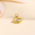 Close-up of 18k gold plated marquise zircon lip-shaped pendant for jewelry making - White
