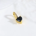 Macro shot of an 18k gold plated heart pendant with a black gemstone and tiny zircon accents - Black Heart Style (ZYN-DMK885G-3)