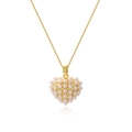 Detailed view of heart-shaped gold necklace pendant set with white round pearls - Golden Heart