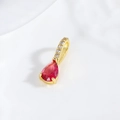Macro view of 18k gold plated teardrop pendant with a faceted red zircon gemstone - Deep Red Water Drop Style (ZYN-DMK884G-6)