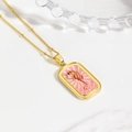 Close-up of golden necklace with pink enamel rectangle pendant featuring a red seahorse - Pink Seahorse Necklace (ZYN-DMK903G-A1)