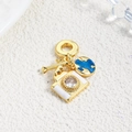 Detailed view of travel-themed charms featuring globe and camera with blue enamel - Globe Camera Bone Combo (ZYN-DMK896G-2)