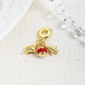 Detailed close-up of gold travel charms including camera, red globe, and airplane pendants - Gold Camera Red Enamel Ball Airplane (ZYN-DMK900G-3)