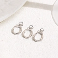 Detailed view of silver oval hammer-textured metal pendants for DIY jewelry crafting - Silver Hammered Oval (ZYN-DMK1022P)