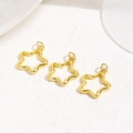 Three hollow gold star charms for jewelry making on a textured white background - Gold Hollow Star (ZYN-DMK1036G)