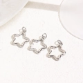Macro shot of three polished silver star pendants for DIY jewelry making and crafts - Silver Hollow Star (ZYN-DMK1036P)