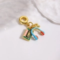 Detail of music charms set with vintage cassette, blue headphones and gold musical note - Music Headphones Tape Style (ZYN-DMK1072G)