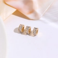 Macro detail of 18K gold plated spacer beads with baguette cut zircon for DIY jewelry - Style 1 (Baguette Zirconia Cylinder) / 14K Gold
