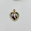 Macro shot of heart-shaped gold necklace pendant with Mary portrait and crystal borders - Virgin Mary Style 3 (DMK1151G-5)
