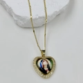 Detailed macro view of heart-shaped gold necklace with Virgin Mary portrait and crystal stones - Virgin Mary Style 3 (DMK1151G-5A)