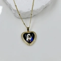 Detail of a gold heart pendant with crystal border and religious icon on a stone - Black Background Mary Style (DMK1151G-7A)