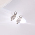Macro shot of silver metal ice cream pendants with sparkling cubic zirconia inlay detail - Silver Ice Cream