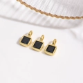 Close-up of three 18k gold plated square charms with black cubic zirconia for DIY jewelry - Black