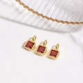 Three square red zircon pendants with 18k gold plating on a clean white background - Red