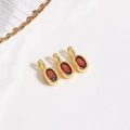 Macro shot of oval red zircon pendant with gold bezel for DIY jewelry making charms - Red Pendant / Pendant Only