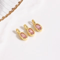 Detailed view of three pink oval zircon charms with gold plated settings for DIY jewelry - Pink Pendant / Pendant Only