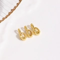 Detail of three gold-plated oval charms with champagne zircon for jewelry DIY making - Golden Yellow Pendant / Pendant Only