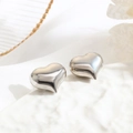 Minimalist silver 3D hollow heart stud earrings on elegant white marble base - Silver Hollow Heart Style (ZYN-DME551P) / Silver