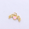 Detail of a gold-plated bat wing pendant with pink enamel heart and sparkling crystals - Pink Gold Wing Heart