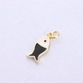 Macro shot of gold-plated fish pendant with black and white enamel finish for DIY jewelry - Black Goldfish