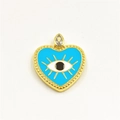 Macro view of gold-plated heart evil eye pendant with blue enamel and zircon inlay - Light Blue Heart Pendant Only (ZYN-DMK439G-C)