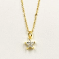 Golden star pendant necklace with micro-paved cubic zirconia on white matte background - Clear Star Necklace