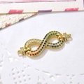 Macro detail of infinity symbol jewelry connector with colorful micro-pave zircons - Gold Infinity Connector (ZYN-DMK499-2)