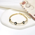Dettaglio del bracciale tennis placcato oro 18K con ciondoli a fiore nero malocchio - Fiore Nero (221116G-B-4)