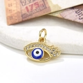 Macro detail of gold-plated evil eye pendant with blue enamel and sparkling cubic zirconia - Dark Blue Eye Style (ZYN-DMK530G-3)