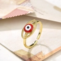 Macro shot of gold Evil Eye ring with red enamel inlay and adjustable band detail - Red Eye Style (ZYN-DMR66G-3)