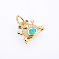 Detail of copper frog pendant with white zircon pavé and blue opal stone inlay - Gold Green