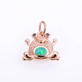 Detail of rose gold frog pendant featuring green opal stone and micro-pave crystals - Rose Gold Green