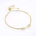 Detailed shot of adjustable gold box chain with opal stones and sliding toggle clasp - Gold White Opal Bracelet