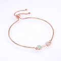 Close-up of rose gold adjustable box chain with opal inlaid dumbbell pendant detail - Rose Gold Pink Opal Bracelet
