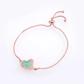 Detailed macro of rose gold heart bracelet with green opal inlay and box chain - Rose Gold Green Opal