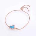 Close-up of heart-shaped blue opal pendant on rose gold adjustable box chain bracelet - Rose Gold Blue Opal