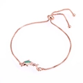 Detail of rose gold dolphin bracelet with opal inlay and adjustable box chain slider - Pisces / Rose Gold Green