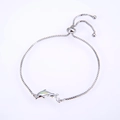 Detail of silver box chain bracelet with opal dolphin charms and adjustable slider buckle - Pisces / Silver Tone Pink
