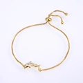 Detail of adjustable gold box chain bracelet with purple opal inlay dolphin pendant - Pisces / Gold Tone Pink