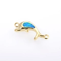 Détail d'un connecteur de bijoux dauphin en or avec incrustation d'opale bleue pour DIY - Or Bleu Dauphin