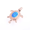Détails du connecteur tortue en or rose avec opale bleue et cristaux brillants - Or Rose Bleu Tortue