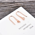 Close-up of rose gold U-shaped earring hooks on a display card for DIY jewelry making - Rose Gold U-Shape Long Style / Rose Gold (kk05-r)