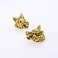 Detailed view of golden wolf head alloy beads for DIY jewelry and paracord accessories - Antique Gold