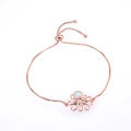 Detalle de la pulsera de pulpo en oro rosa con opalo blanco y cristales rosa suave - Pulsera de Pulpo de Ópalo Blanco en Oro Rosa