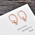 Detail of rose gold U-shape earring hooks with spiral scroll patterns on cardstock - Rose Gold (kk06-r)