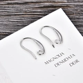 Macro detail of polished silver U-shape earring hooks for DIY jewelry making craft - Silver (kk08-p)