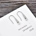 Detailed macro view of silver U-shaped earring hooks with screw thread and closed ring - Silver (kk11-p)