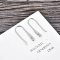 Detail of silver U-shaped earring hooks for DIY jewelry making on a white card - Silver (kk12-p)